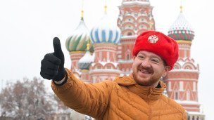 Турист позирует на Красной площади