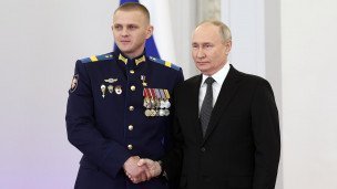 Президент России Владимир Путин во время вручения наград