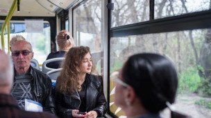 Пассажиры в автобусе