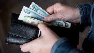 Рублевые купюры в кошельке
