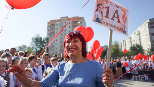 Учитель на линейке