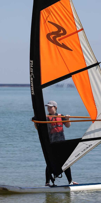 Участник Всероссийских соревнований по виндсерфингу