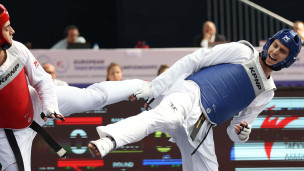 Владислав Ларин в поединке по тхэквондо