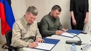 Максим Решетников и врио главы Республики Денис Пушилин