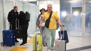 Туристы в аэропорту 