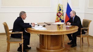 Владимир Путин и Рустам Минниханов во время встречи