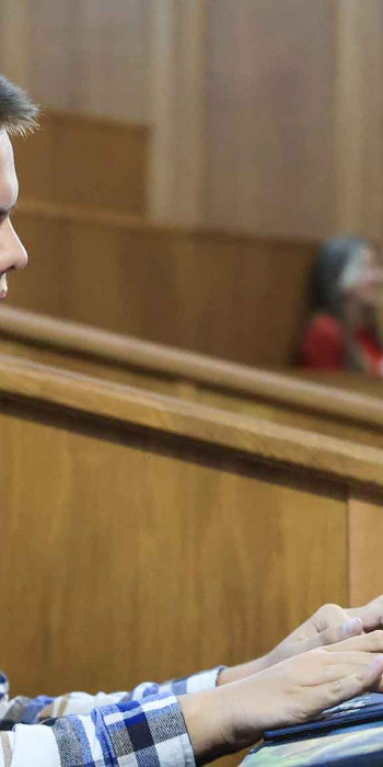 Студент в лекционной аудитории