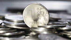 Монета российский рубль