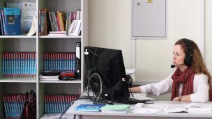 Учитель за компьютером