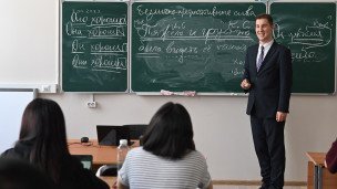 студент у доски на лекционном занятии 