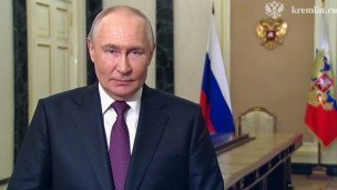 Владимир Путин во время видеообращения в преддверии официального визита в КНР